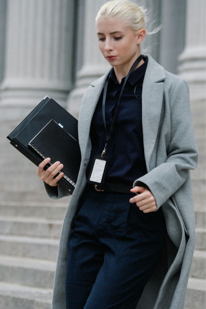 Female attorney exiting a government building