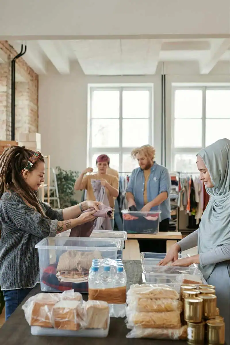 Volunteers packaging food